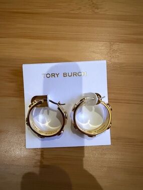 Tory Burch Gold toned Logo Hoop Earrings